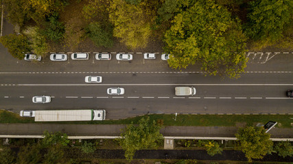 Aerial Drone Flight top down view of freeway busy city rush hour heavy traffic jam highway.  Aerial...