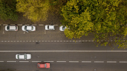 Aerial Drone Flight top down view of freeway busy city rush hour heavy traffic jam highway.  Aerial...