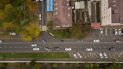 Aerial Drone Flight top down view of freeway busy city rush hour heavy traffic jam highway.  Aerial...