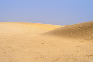 Fototapeta na wymiar The mountains of the sands and desert dunes of Thal Desert Pakistan