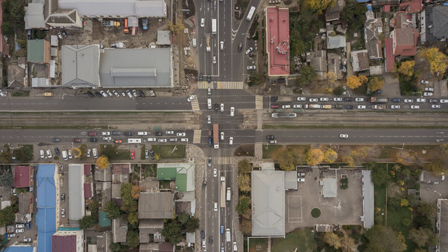 Aerial view of the road junction. Panoramic shot of a huge network of flyovers, junctions, intersections, roads, bridges 