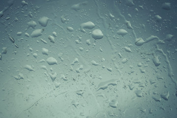 Water drops on glass for background