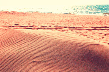 sunny weather , sandy dunes on the beach 