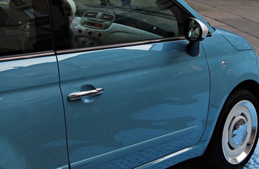 Italy: Particular of small car.