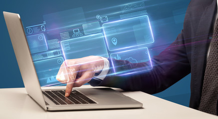 Hand typing on laptop with online accounting system concept
