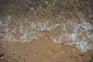 Soft wave of the sea on the sandy beach