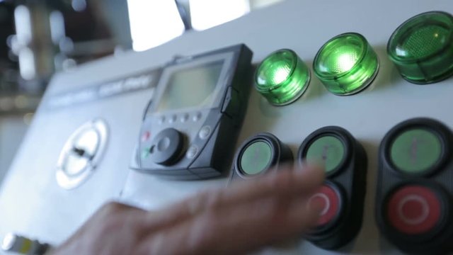 Man pushes a buttons and the indicators lights on