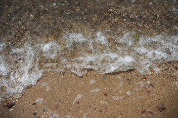Soft wave of the sea on the sandy beach