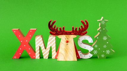 Christmas decoration with xmas text and a reindeer