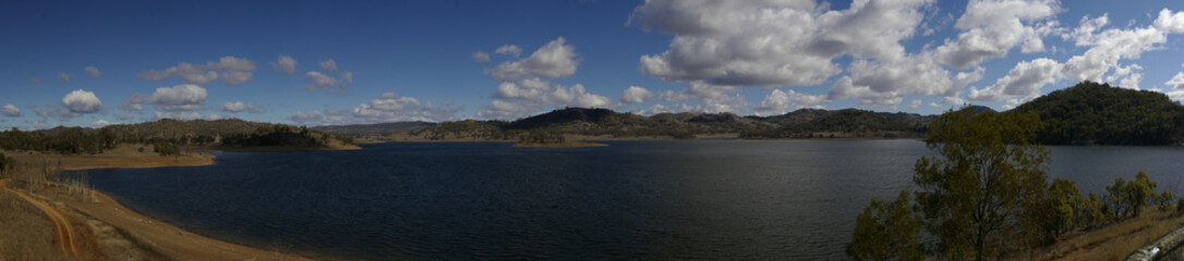 panoramic view of an almost full water resevoir/dam in Rural New South Wales during a drought, very dry season, local water supply used in farming, Australia
