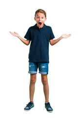 Full body of Little boy with surprise and shocked facial expression on white background