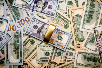 Fototapeta premium a pack of lies the US currency on background of dollars 