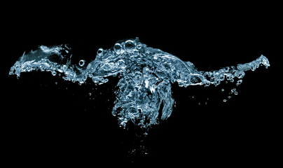 Fototapeta na wymiar water splash with drops isolated on black background
