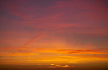 Naklejka na ściany i meble Sunset sunrise dramatic sky orange clouds