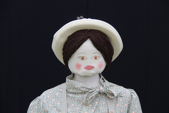 The Head and Shoulders of a Life Size Material Doll.