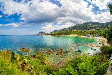 Fototapeta na wymiar Summer beach holiday on the coast of Sicily island on Cefalu region