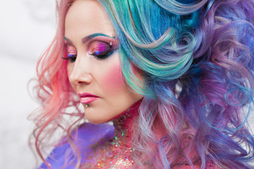 Beautiful woman with bright hair. Bright hair color