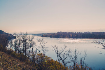 Autumn mountain forest landscape with roads and rivers