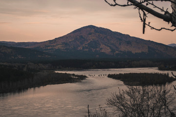 Autumn mountain forest landscape with roads and rivers