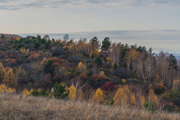 Autumn mountain forest landscape with roads and rivers
