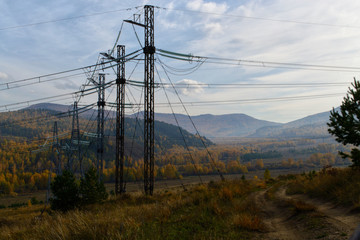 Autumn mountain forest landscape with roads and rivers