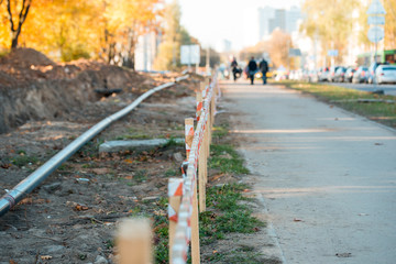 Water pipeline near footpath in the city.