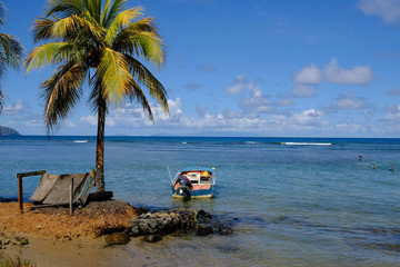 Obraz premium Calibishie coast and boat, Dominica