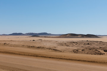 Endless gravel roads to Cape Cross, Namibia.