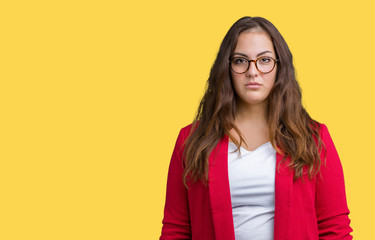 Beautiful plus size young business woman wearing elegant jacket and glasses over isolated...