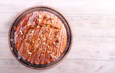 Cake with icing and nuts