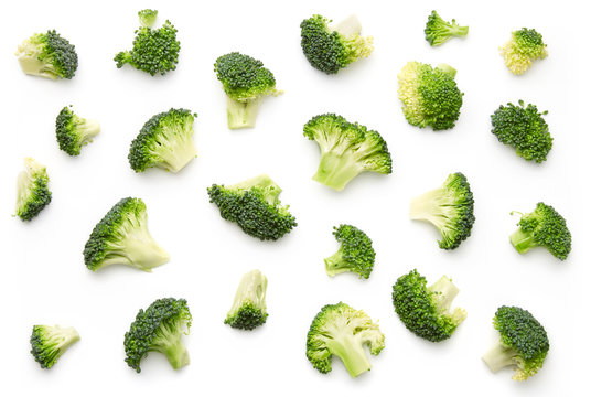 Broccoli pattern isolated on a white background. Various multiple parts of broccoli flower. Top view. 