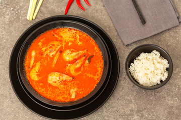 Thai spicy-sour soup Tom Yam with shrimp