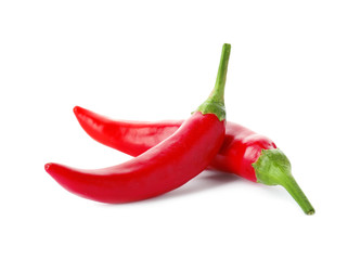 Red hot chili peppers on white background - obrazy, fototapety, plakaty