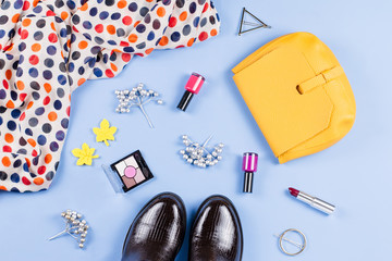 Woman fall clothes and accessories flat lay. Female autumn fashion concept. Top view