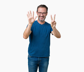 Fototapeta premium Handsome middle age hoary senior man wearin glasses over isolated background showing and pointing up with fingers number seven while smiling confident and happy.