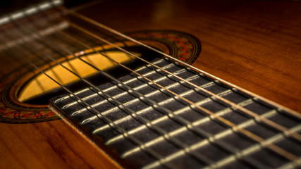 Fototapeta premium closeup of brown acoustic guitar. art and music background