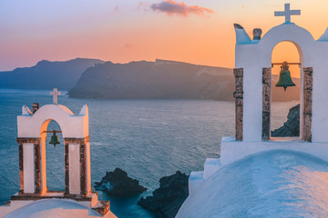 Traditional Greek churches in Santorini sunset