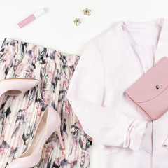 Woman clothes and accessories - skirt, jacket, shoes in pastel pink colors