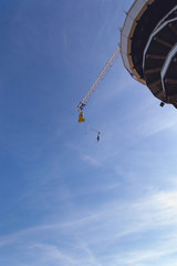 view from above on unidentified man doing bungee jump