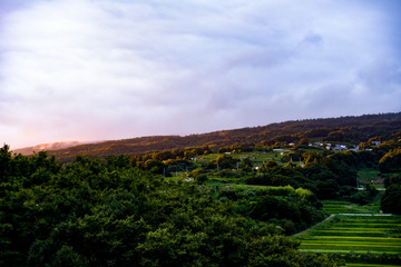 Naklejka premium 夕暮れの山村