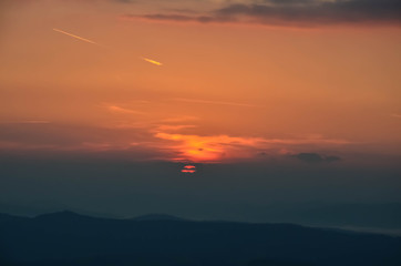 Plakat sunset in the mountains