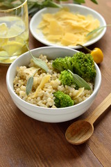 Brown rice with broccoli and parmesan cheese, vertical 