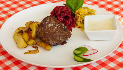 Dinner plate - Steak with baked potatoes, grated beets and salad