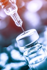 Vaccine vial dose flu shot drug needle syringe,medical concept vaccination hypodermic injection...