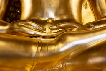 Fototapeta na wymiar Golden is Buddha statue in Meditate of Thailand temple agent of Buddha In Buddhism 