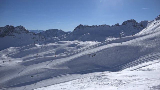 The upper part of the ski resort Zugspitze as seen from the Zugspitzplatt, central hub for all skiing lifts and the Zugspitz train glacier station.