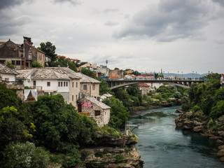 Fototapeta na wymiar Mostar city situated on the Neretva river in Bosnia and Herzegovina