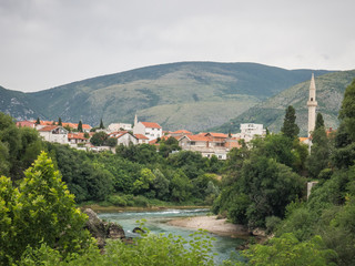 Fototapeta na wymiar Mostar city situated on the Neretva river in Bosnia and Herzegovina