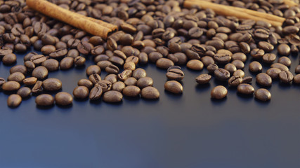 A scattering of coffee beans and cinnamon sticks on a dark blue background with copy space