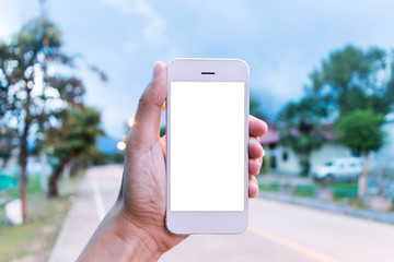 Young man is taking photos to capture memories. And this handset was used 5 years ago.